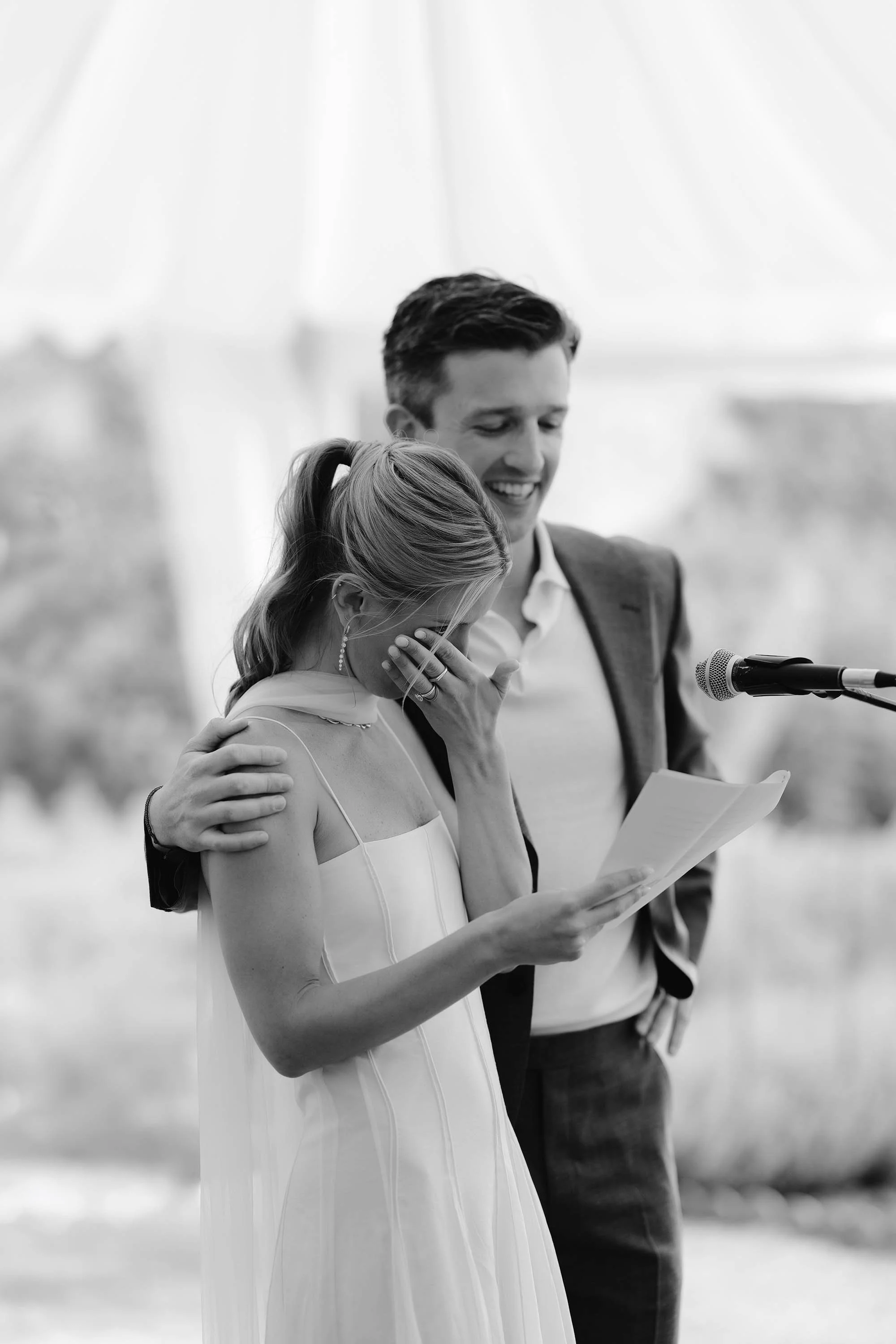 bride cries delivering speech at pre-wedding event