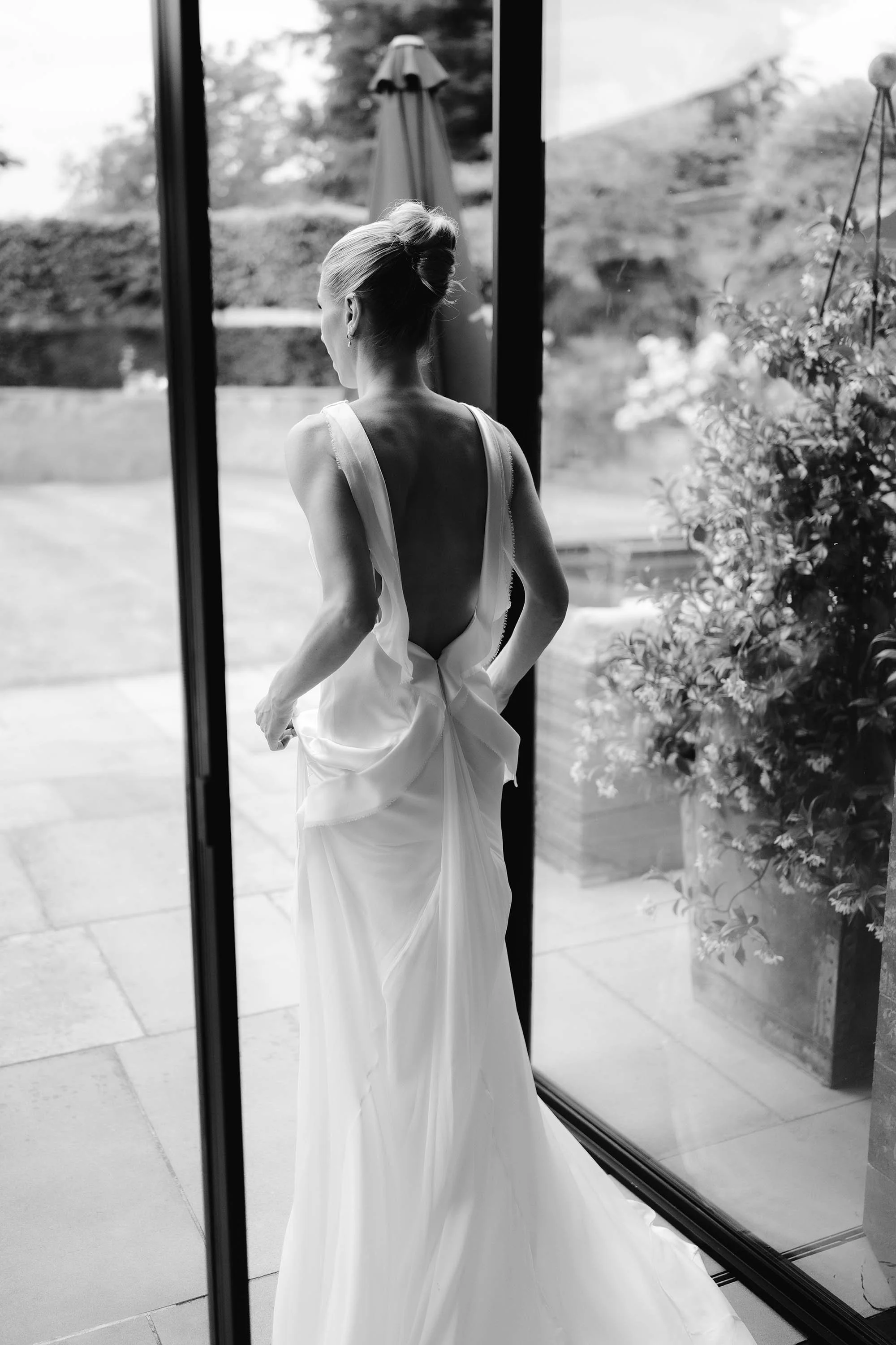bride in low back danielle frankel wedding dress