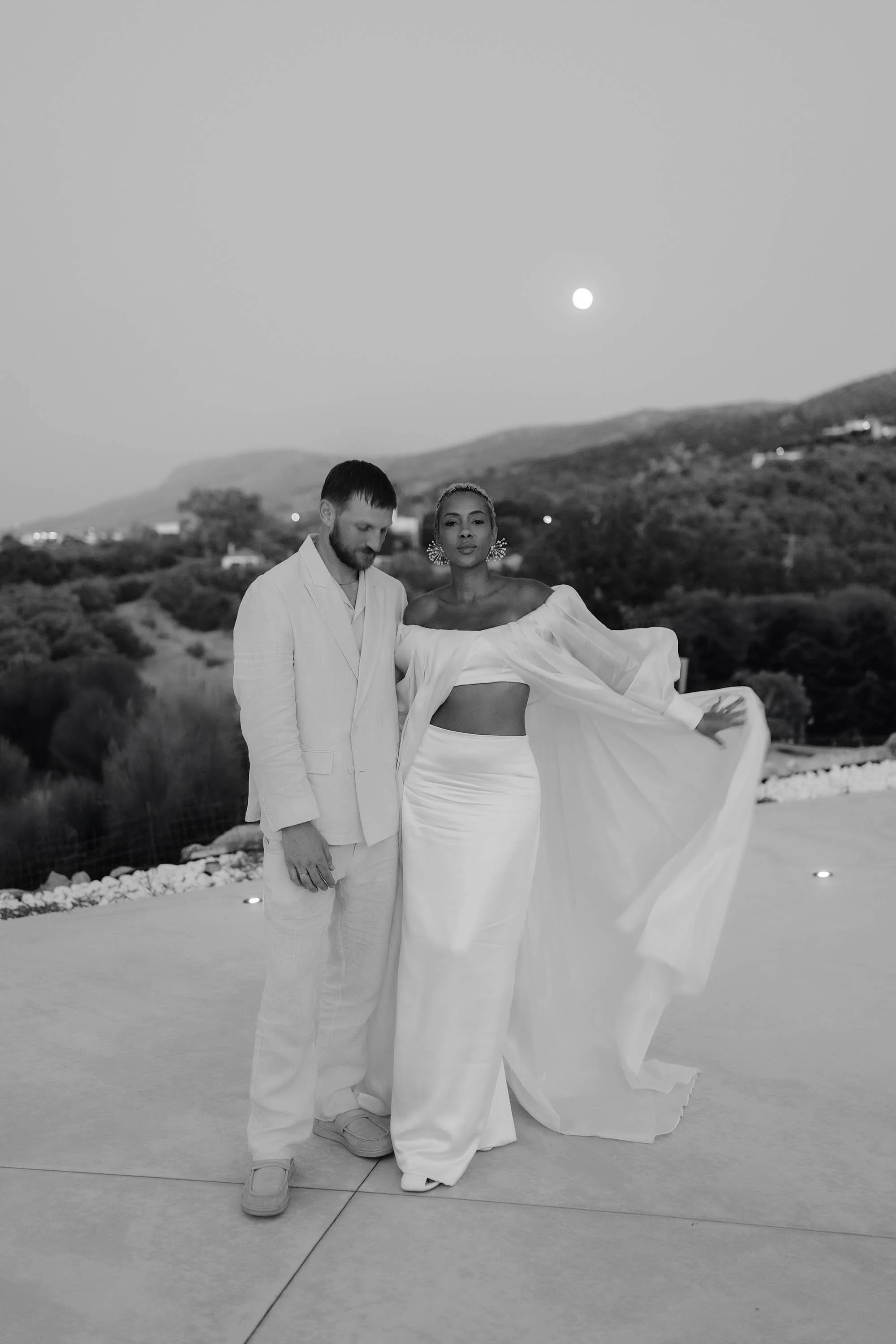 bride in bespoke wedding dress poses for portraits for greece wedding