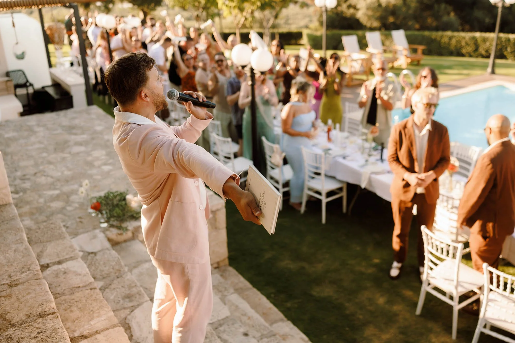 comedian announces couple to wedding reception in greece