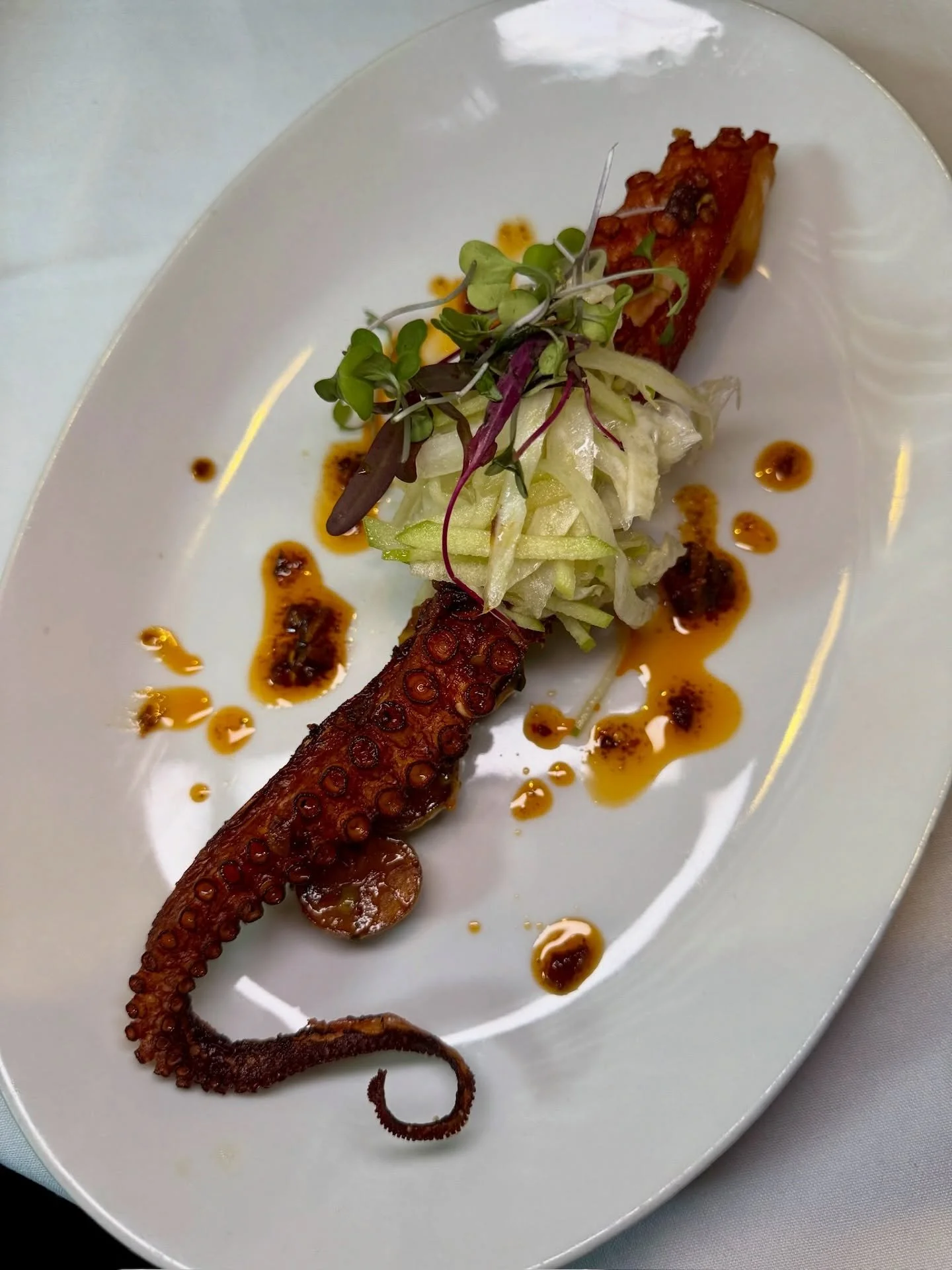 New from the Fall Menu: Crispy Spanish Octopus | warm crispy fingerling potato salad, smoked bacon and red chili vinaigrette, fennel and apple salad. One bite and you&rsquo;ll understand the obsession.