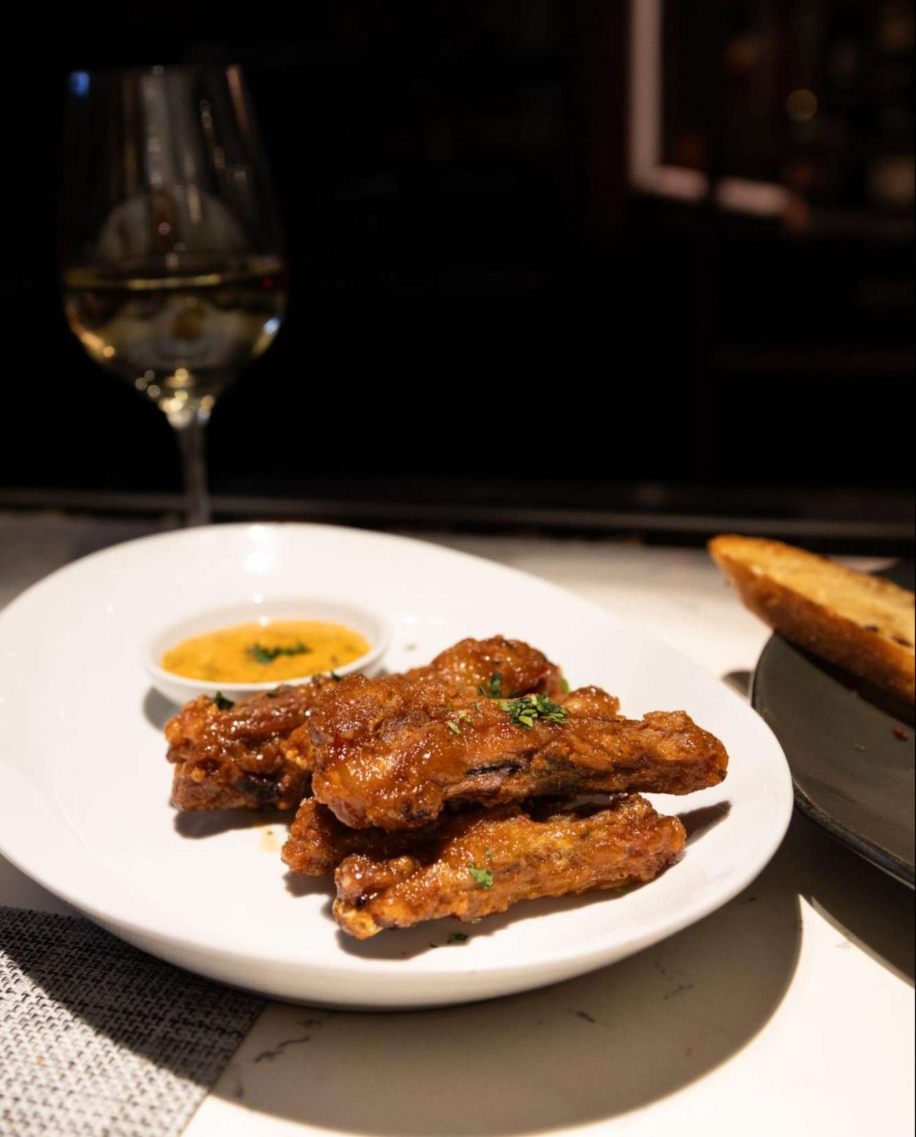 Saucy. Savory. Satisfying. A Social Hour bite that means business. Crispy Duck Wings - a social hour exclusive. Monday through Thursday from 4:30 PM-6:00 PM at the bar. See you soon.