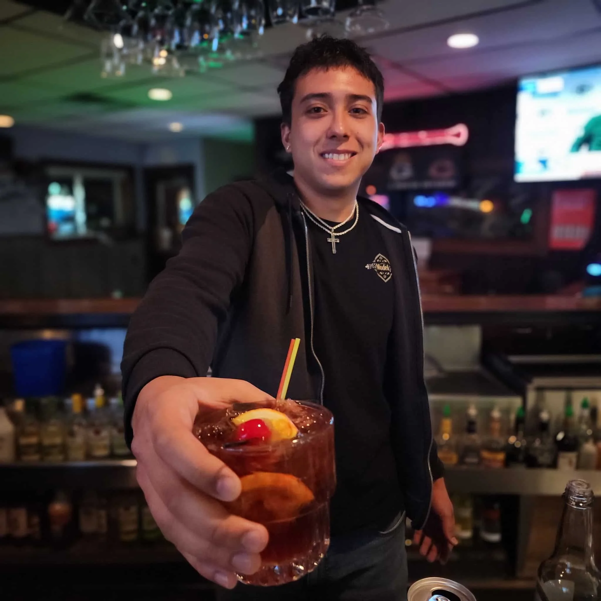 centerhouse-green-lake-bartender-serving-old-fashioned.jpg