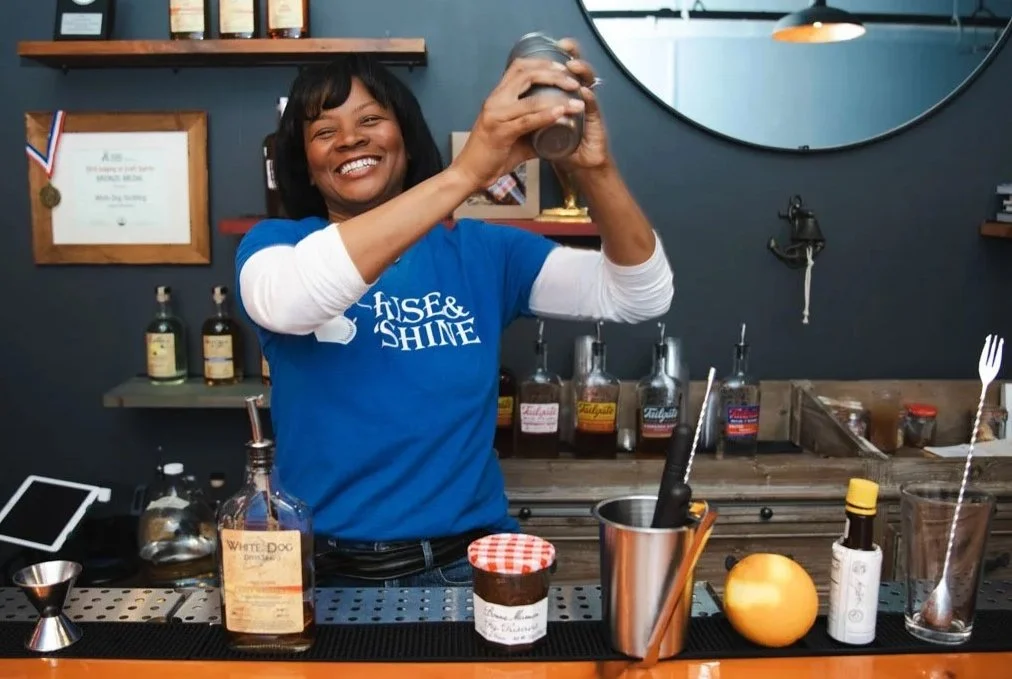 Co-Owner at White Dog Distilling making a cocktail, showing product and business environment photography in Rhode Island