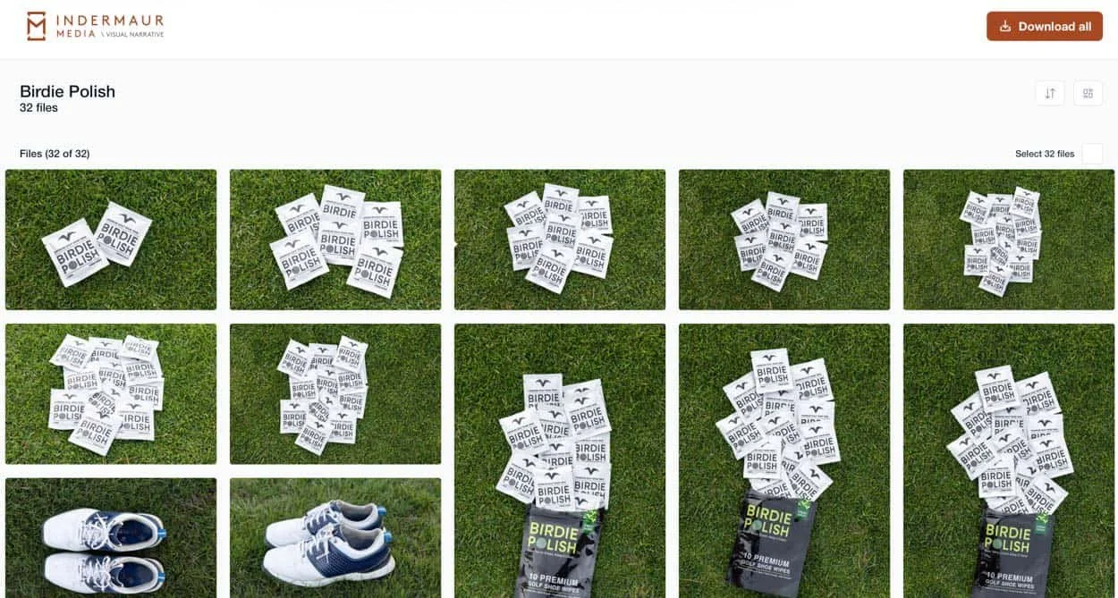 Product photography gallery showing Birdie Polish packaging photographed on grass in multiple compositions