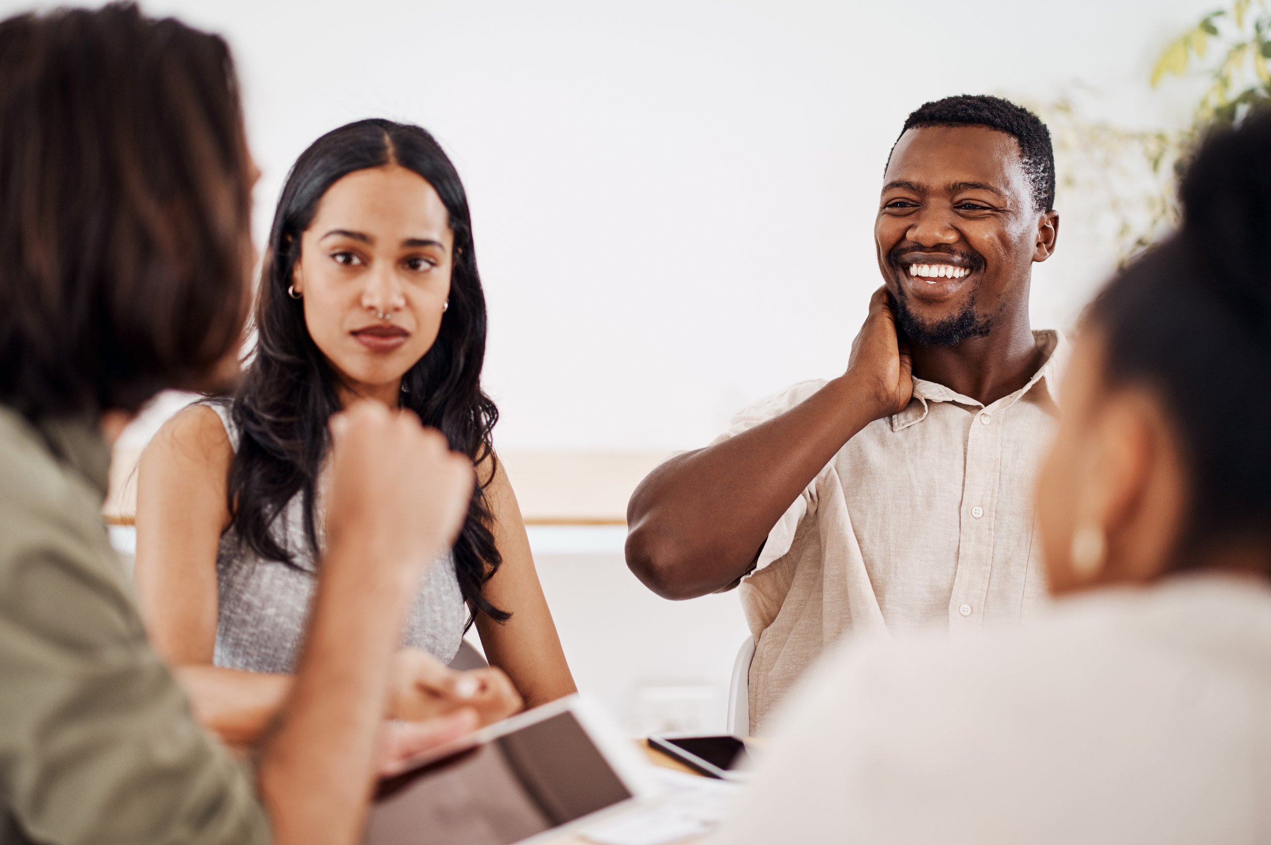 A man and woman in a meeting
