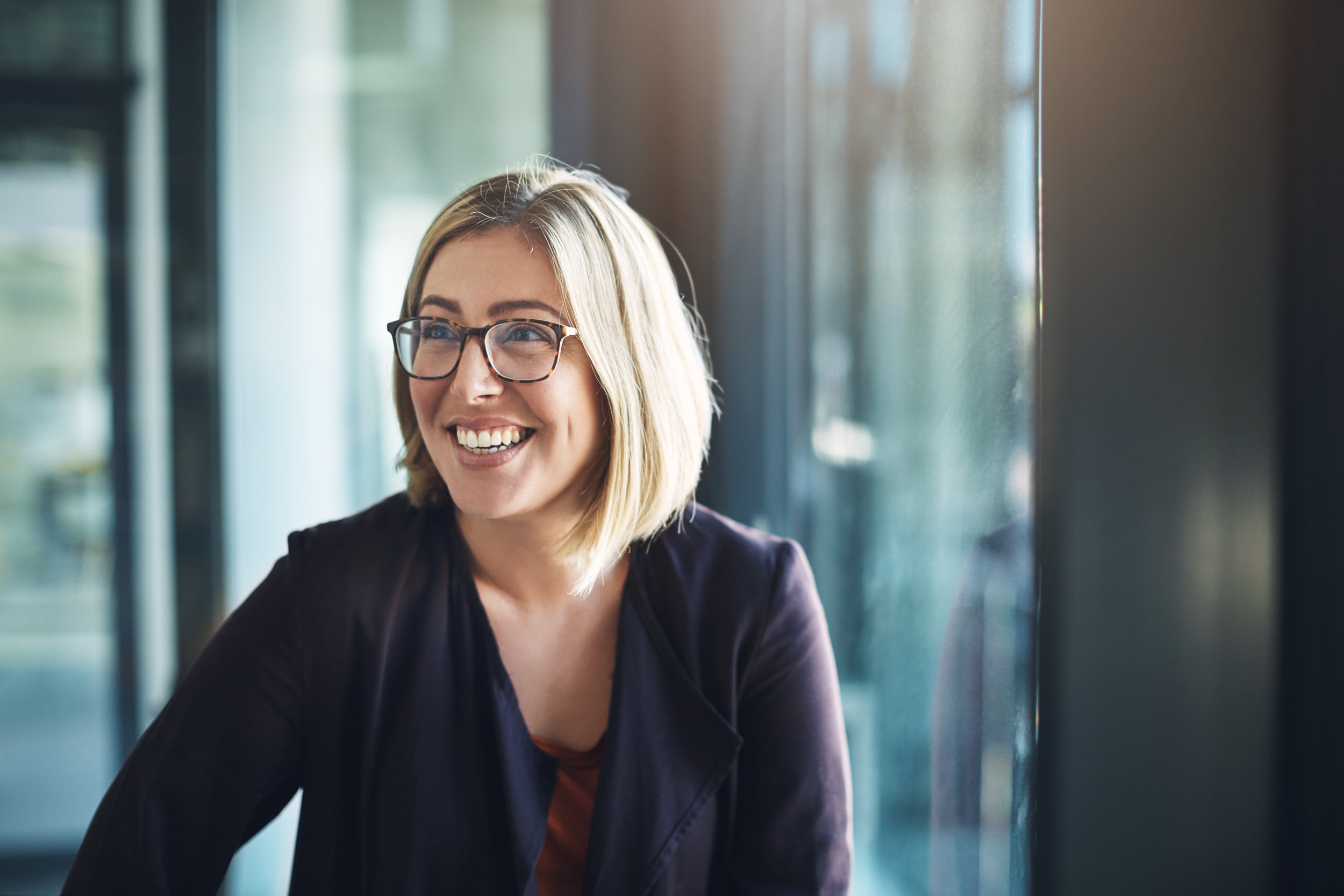 A woman smiling at work