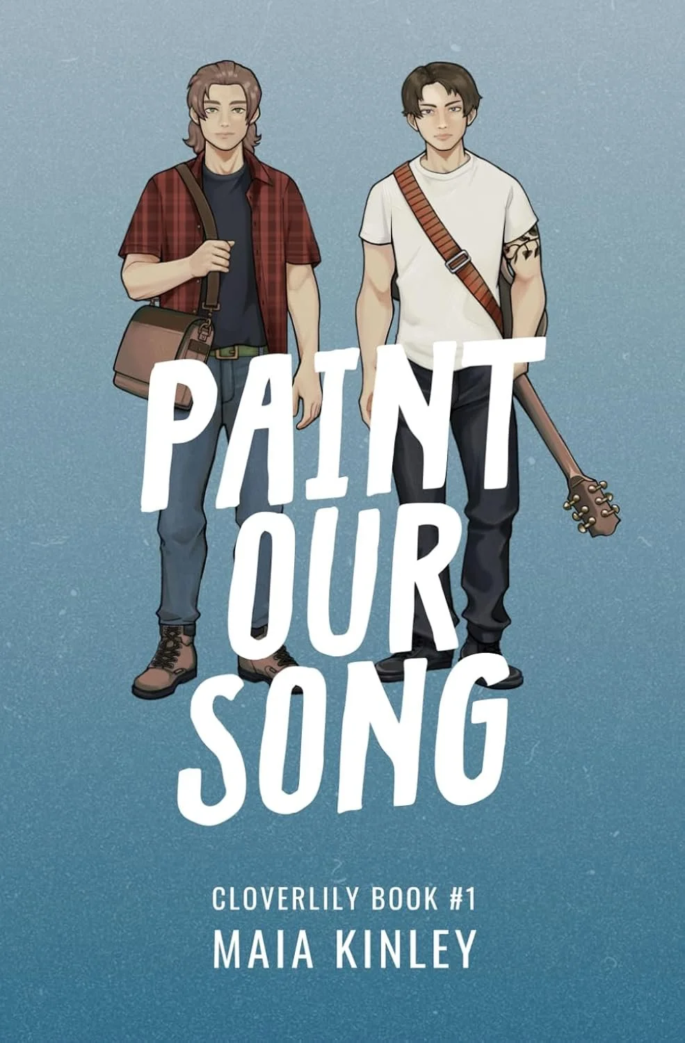 Book cover of 'Paint Our Song' by Maia Kinley, featuring two young men with casual clothing and a guitar, against a blue background.