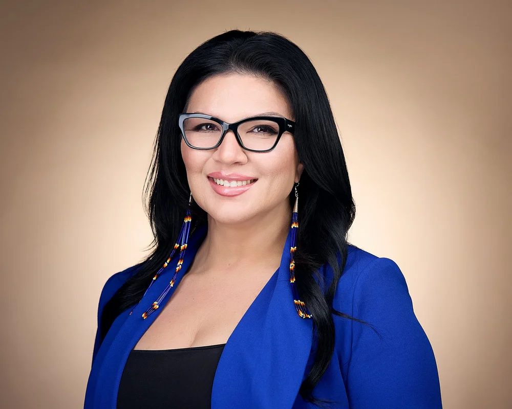 Client reviewing and selecting professional headshot images after a session