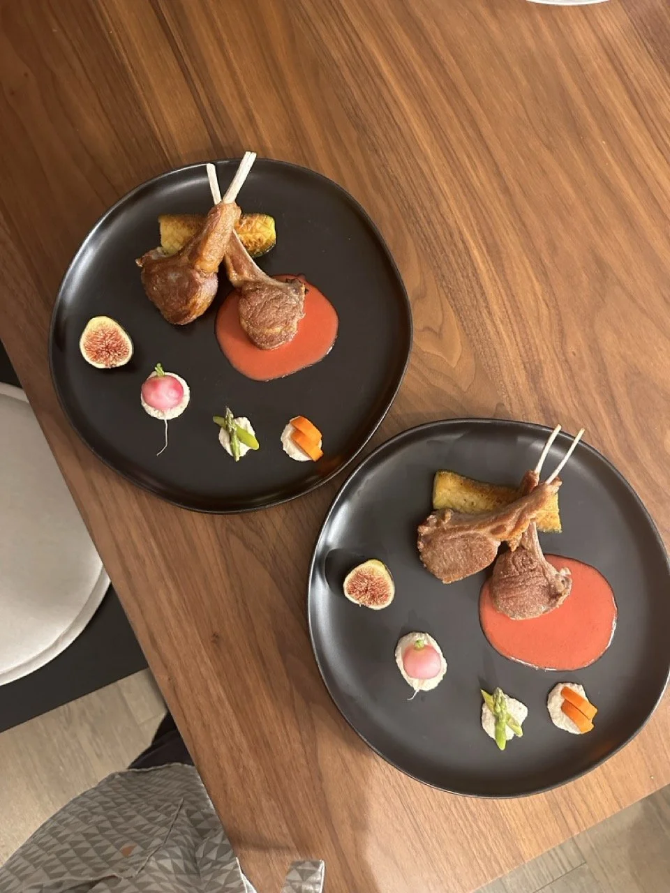 Lamb chop with raspberry sauce and assorted veggies