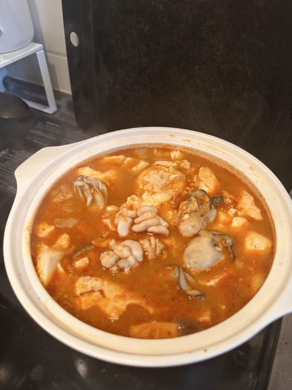 Soondubu-jjige with shirako and oyster