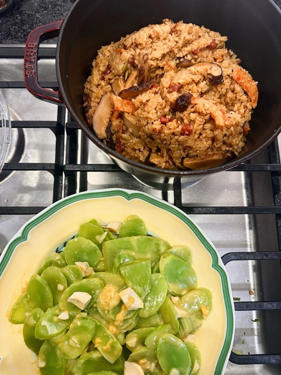 Cast iron pot rice and celtuce stir fired with salted egg
