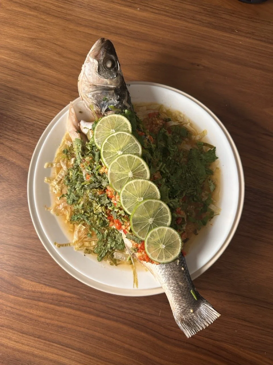 Steamed Sea bass in spicy and sour marinate