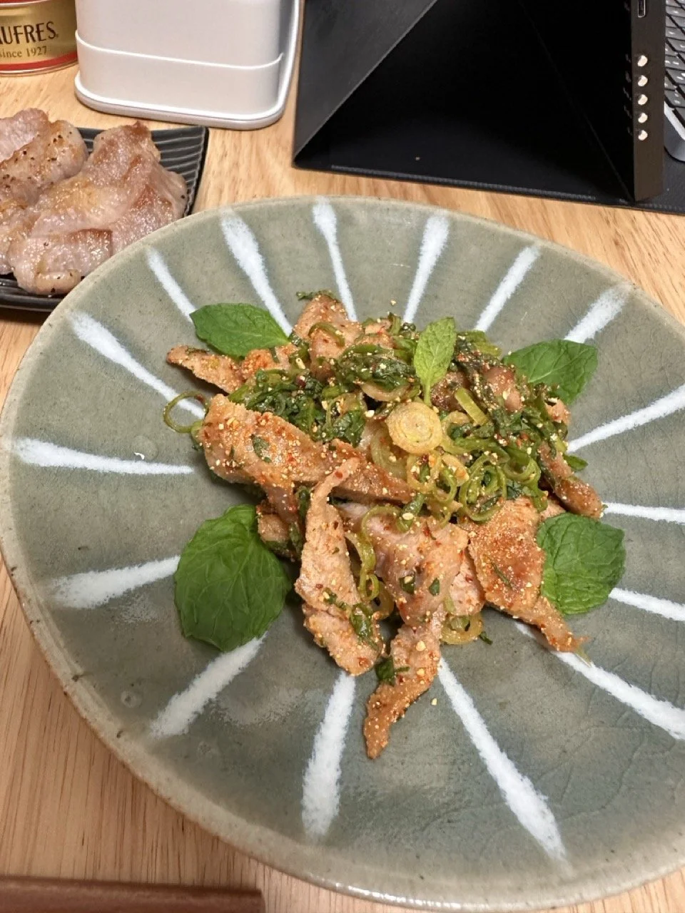 Grilled pork neck nam tok (Lao spicy salad)