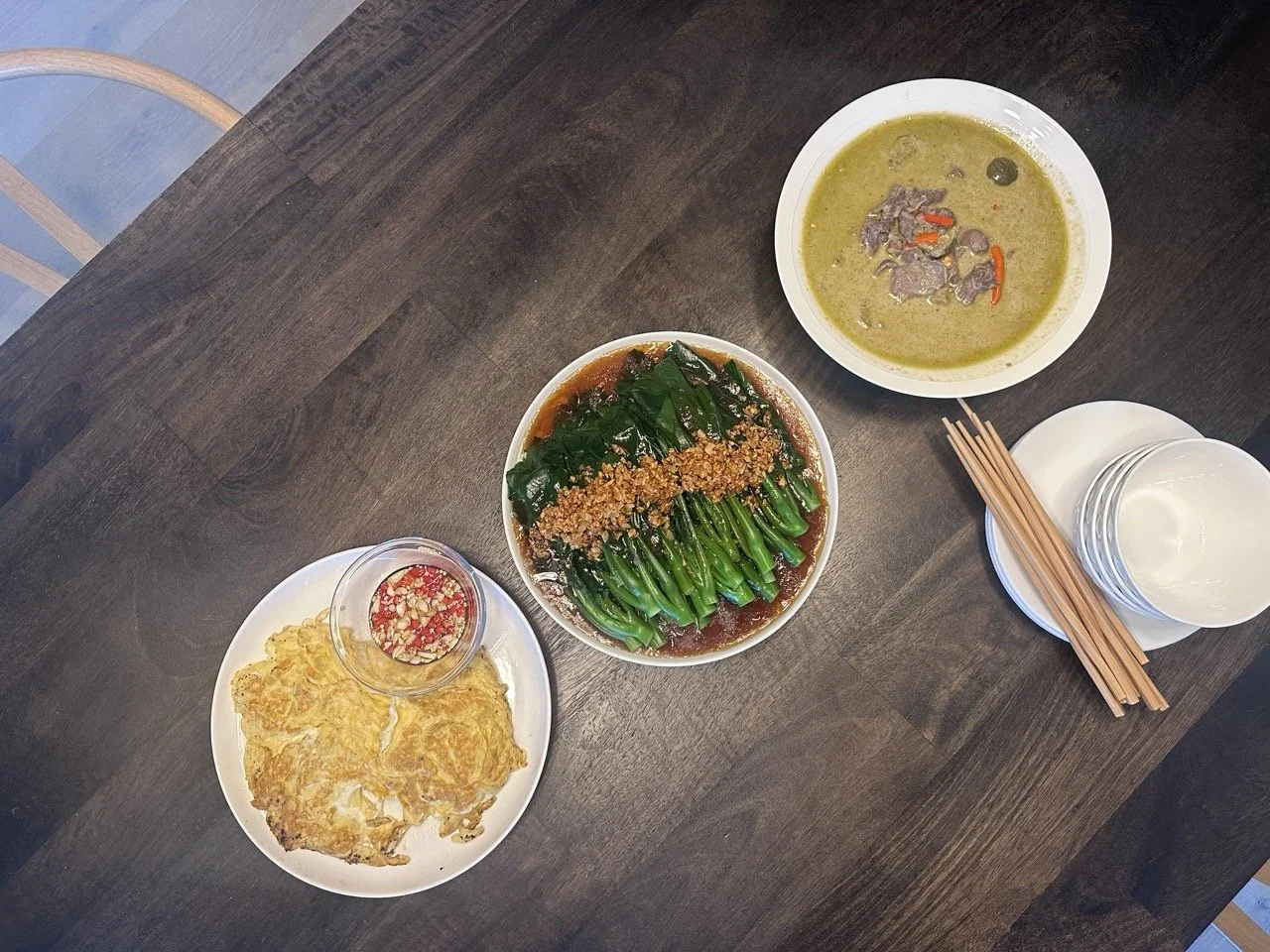 From the left, Thai style fried omelette, Gailan in oyster sauce, beef green curry