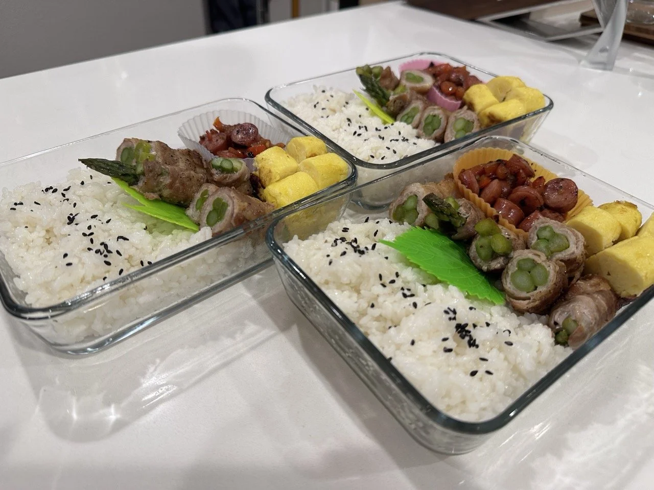 Pork belly wrapped asparagus, Japanese sweet roll omelette, fried sausage