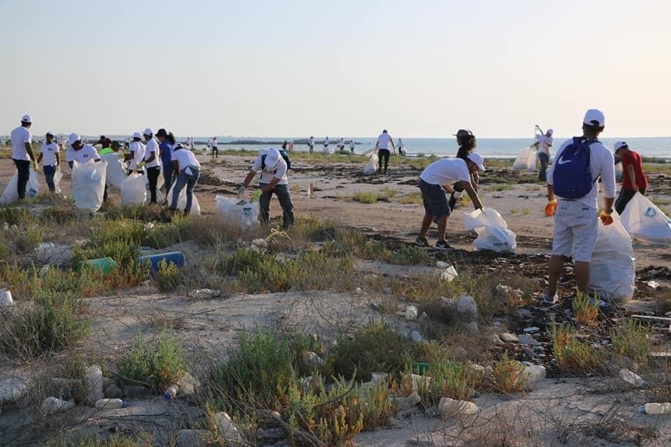 Qatar beach cleanup: picking up litter