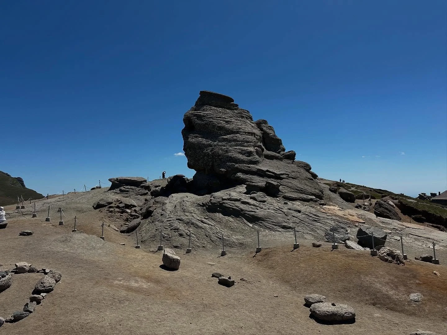 Quick cleanup at 7,200 feet altitude in the Carpathian Mountains. Leave any place better than you found it !! Anthropomorphic rock formations are Quaternary era 2 million year old monoliths formed largely through wind erosion.