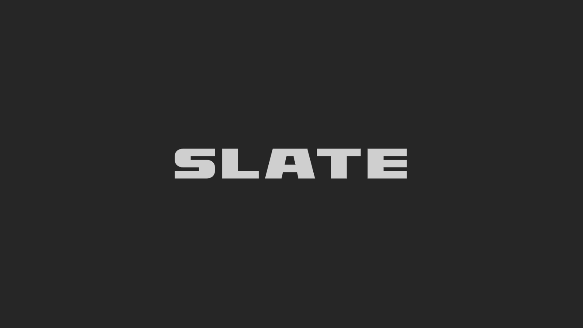 The word 'SLATE' in gray uppercase letters on a dark gray background.