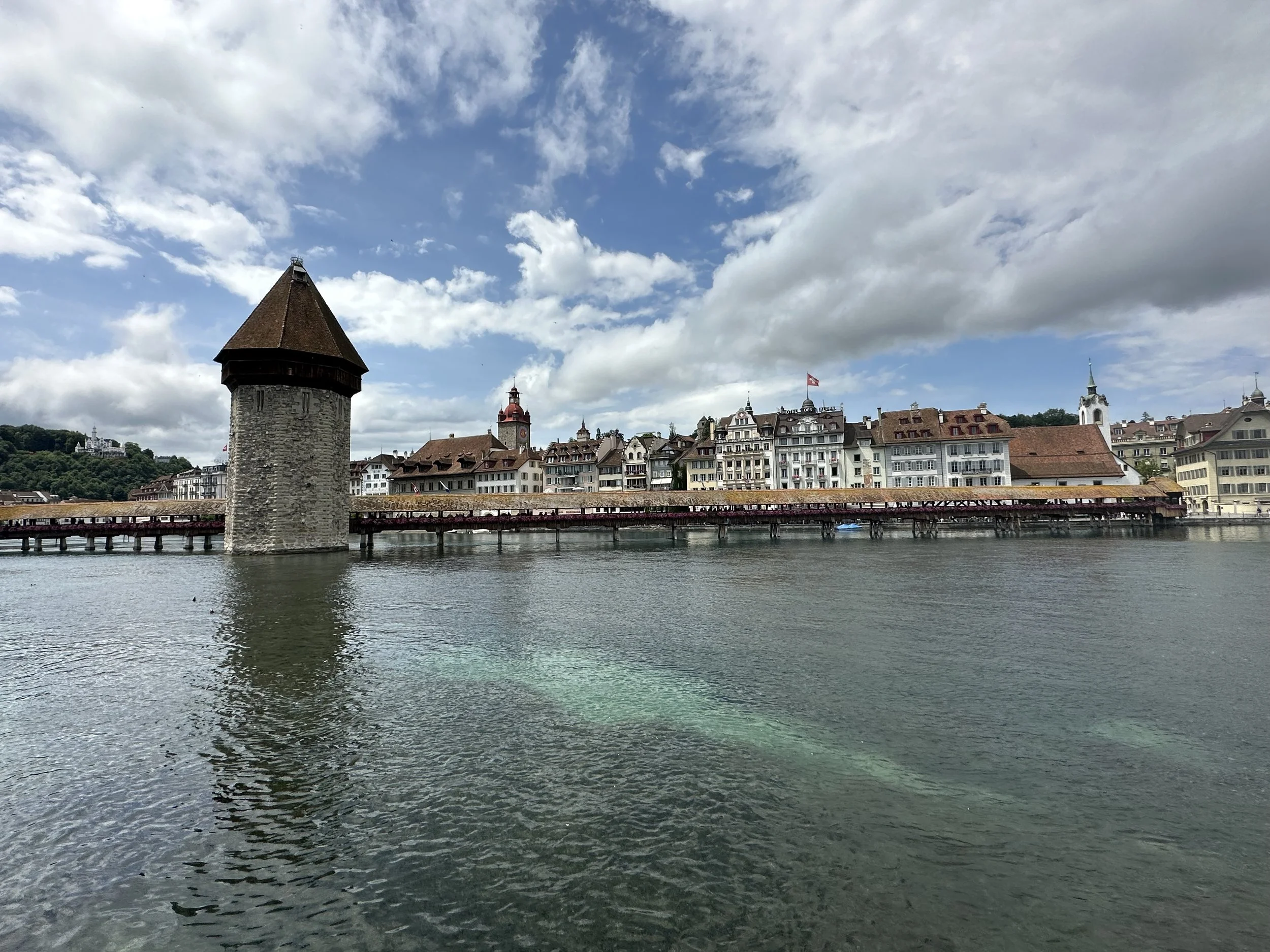 A PHOTO OF THE CHAPEL BRIDGE IN LUZERN, SWITZERLAND