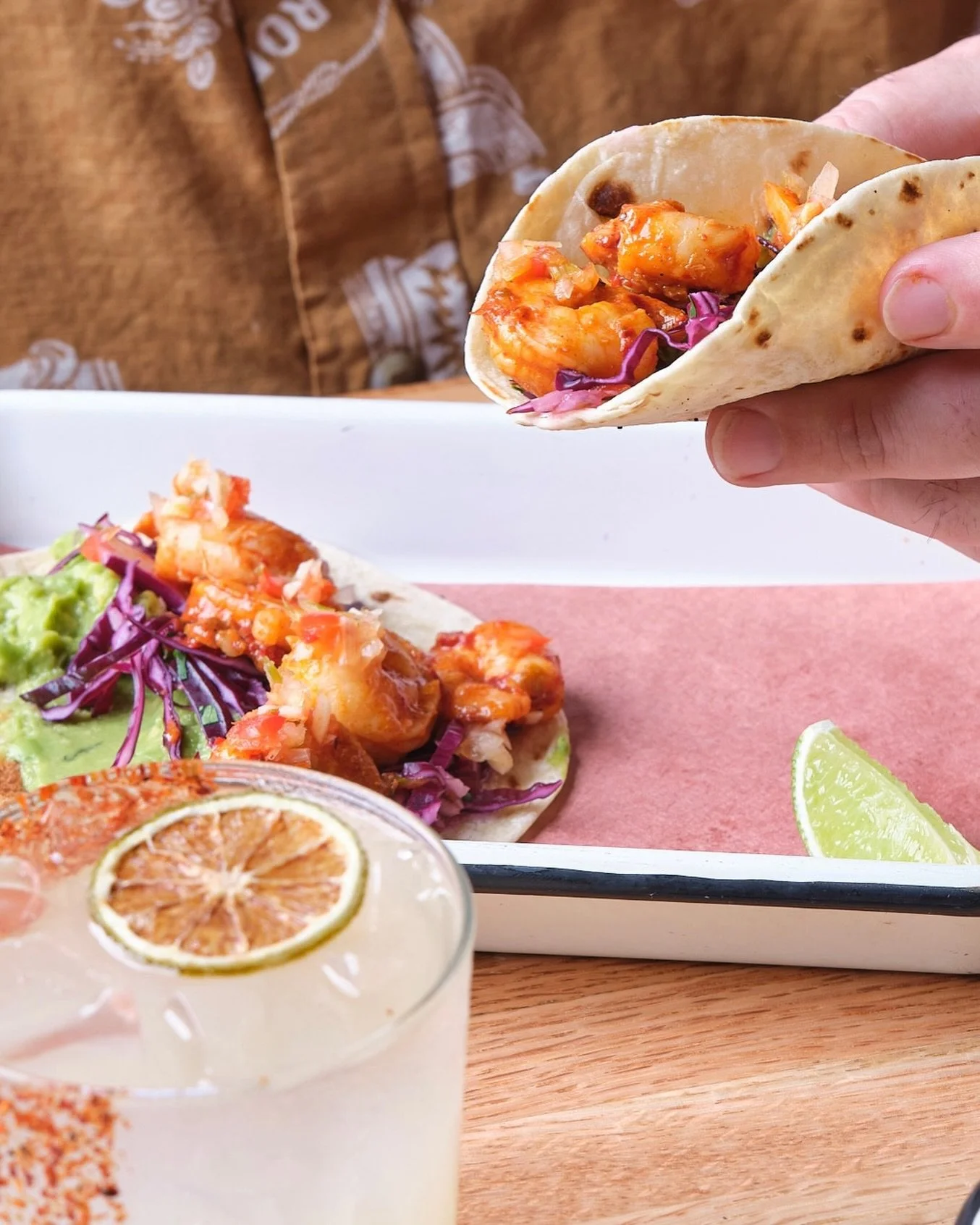 Bite into our Shrimp Enchilado Tacos with red chili sauce, red cabbage ensalada &amp; guacamole every Tuesday of March 🍤

Plus, enjoy free premium upgrades to @drinkdulceoro on classic margaritas!