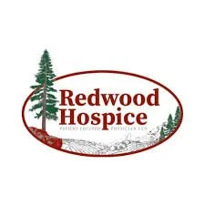 Group of diverse people happily sitting and lying on grass outdoors, enjoying a sunny day.