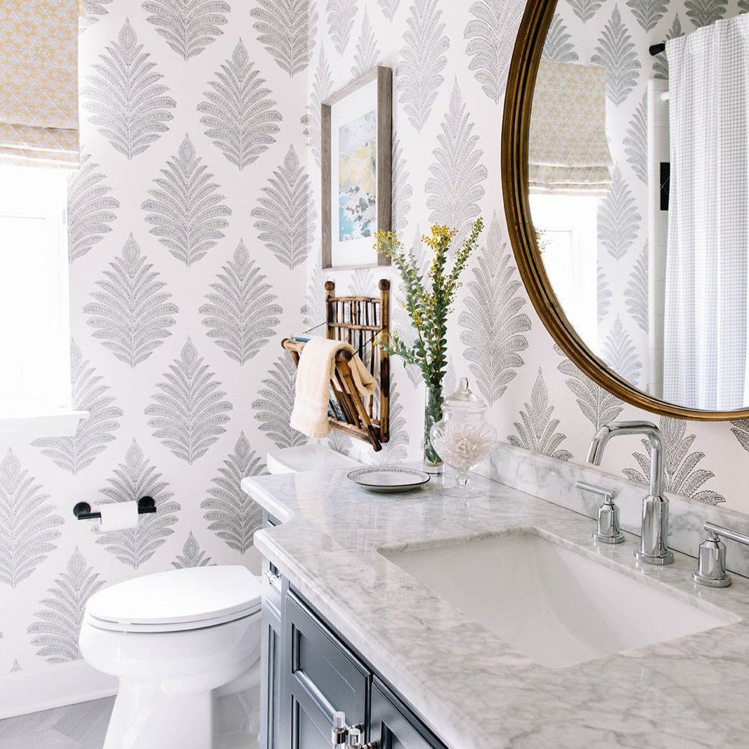 fun wallpaper in small bathroom renovation