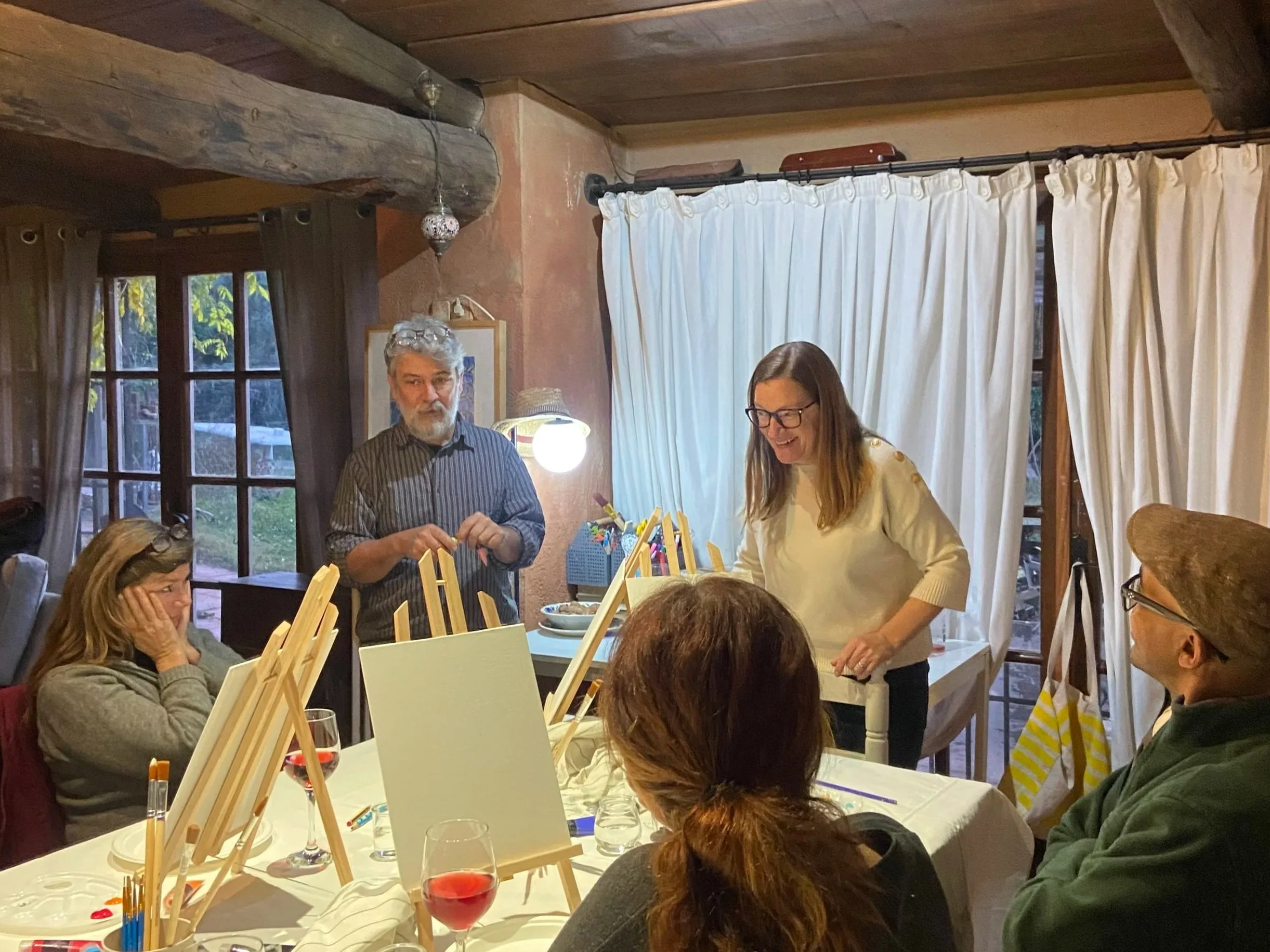 Exploring a painting session and wine tasting during a Caliu Cultural creative and cultural experience in Empordà.