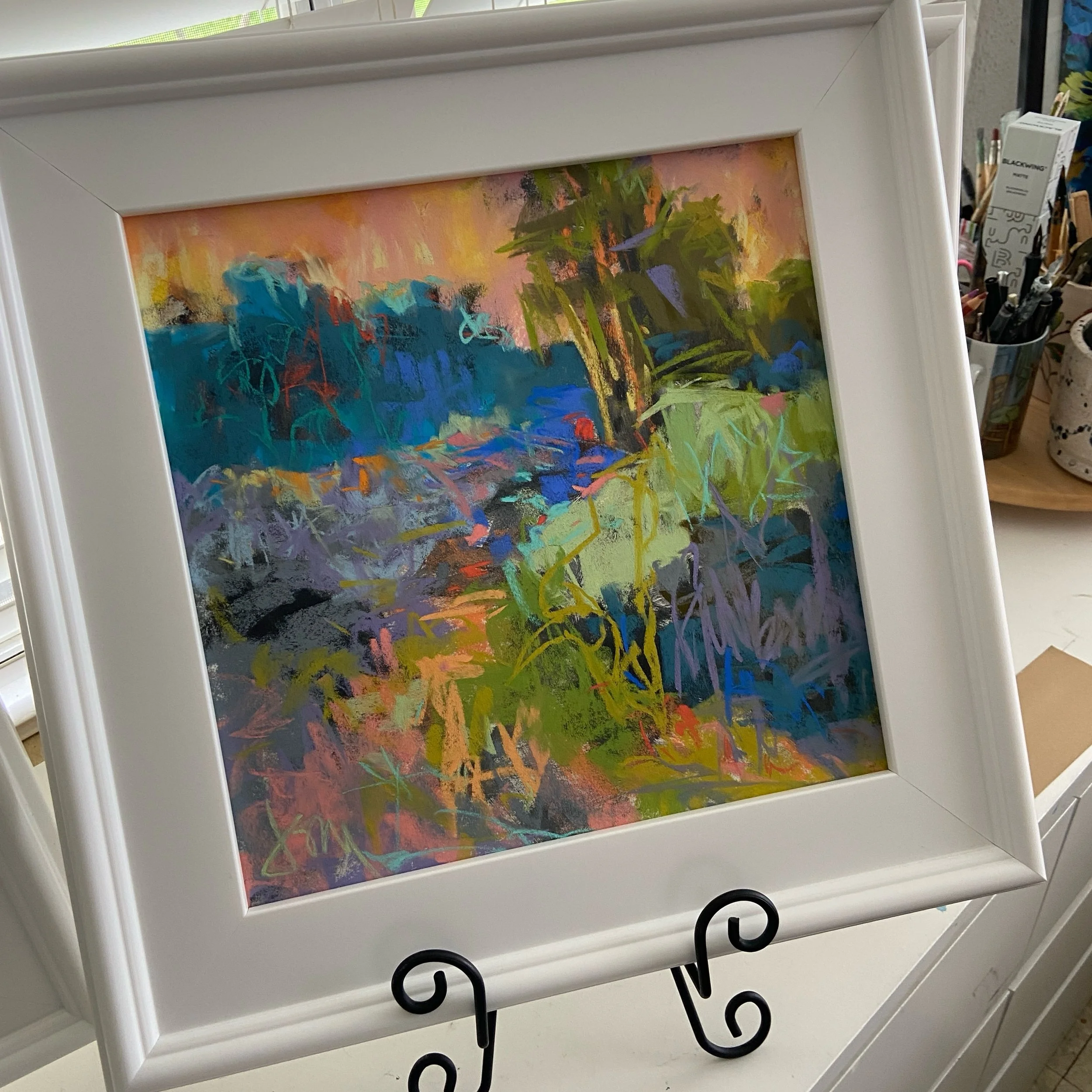 Messing around today- finally just gave in to the scribble! Soft pastel on sanded paper. Loving these bold colors in this white frame. #abstractlandscapepainting #pastel #landscape #joycesheltonstudio