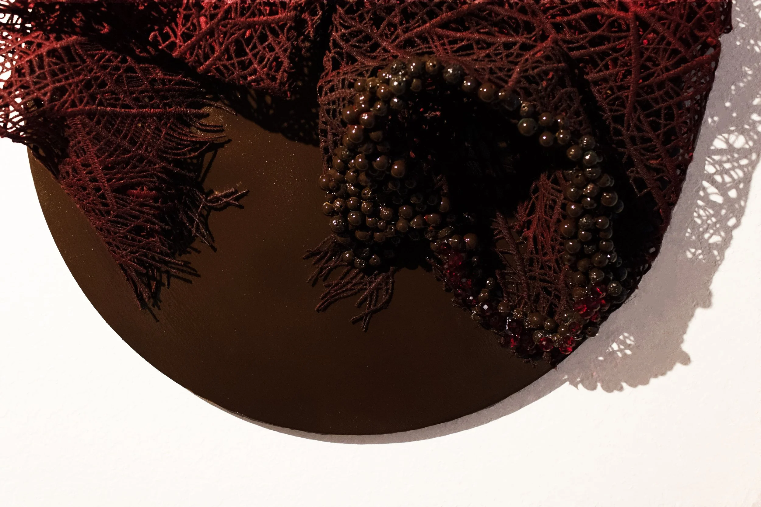 "Soft Shell"
Oil, acrylic, lace, and beads on panel 
10" in. diameter
2026
(Close-up Image 2)