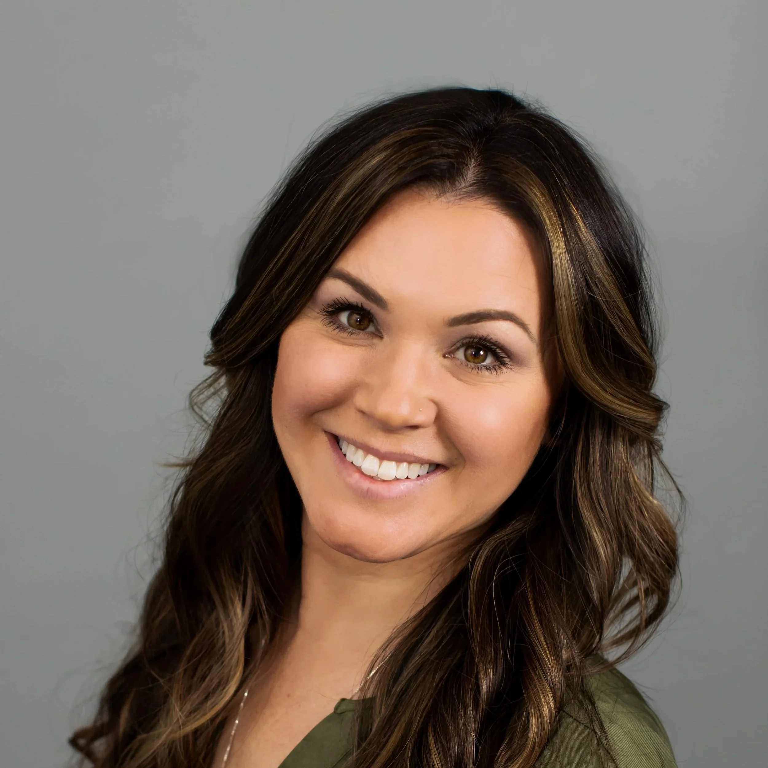 Blue circular icon with a white person silhouette in the center