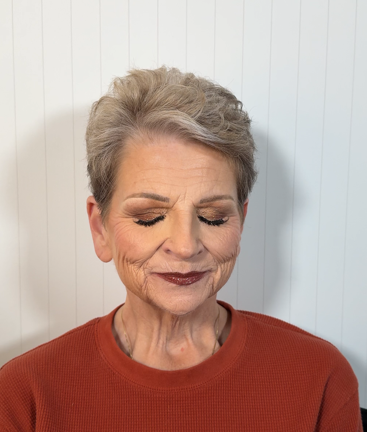 Full glam makeup on mother of the bride who has mature skin and is fair-light skinned by Kenya Beats Makeup Artistry in Winston-Salem, NC.