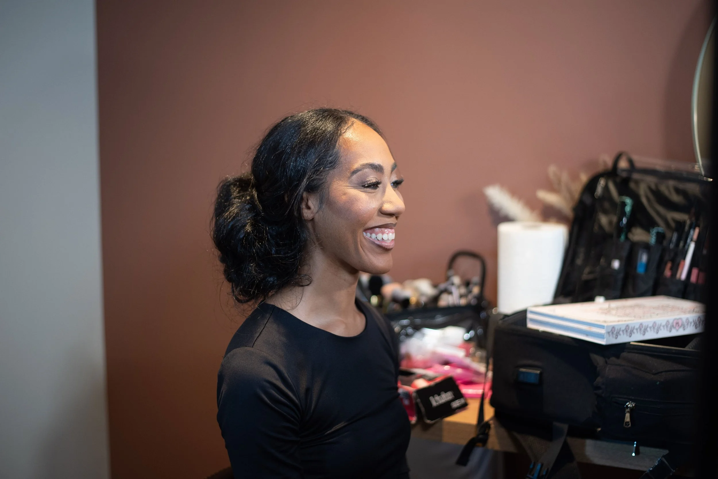 Soft smokey glam by Kenya Beat Makeup Artistry on brown skin model for a fashion show in Charlotte, NC.