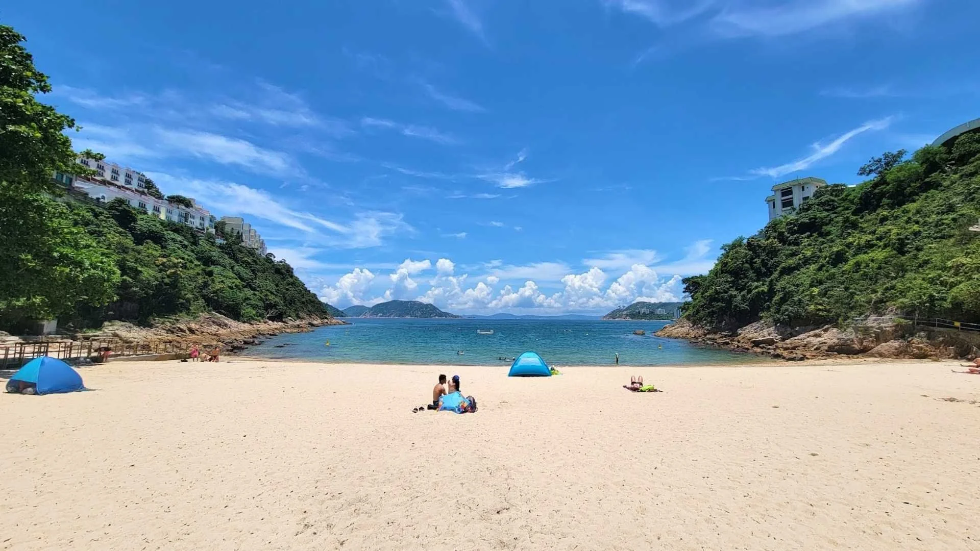 Aerial view of a secluded junk boat at anchor in the tranquil, emerald waters of Turtle Cove, Southside Hong Kong