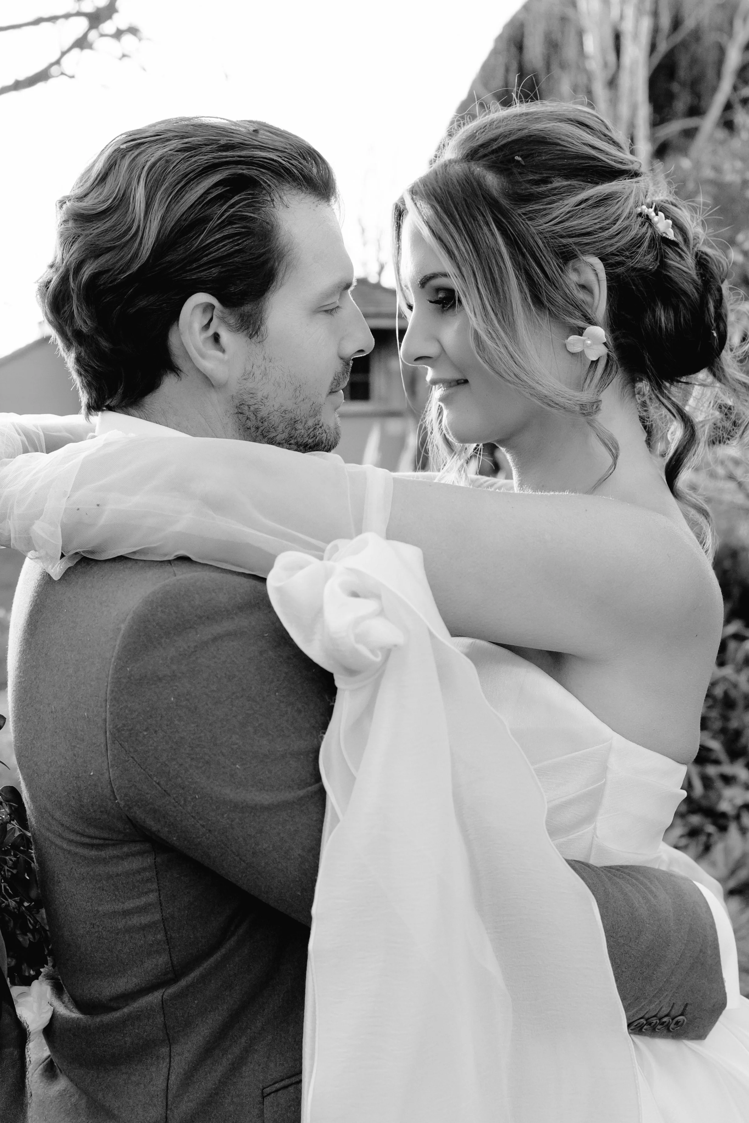 Newlyweds pose for a photo after their ceremony