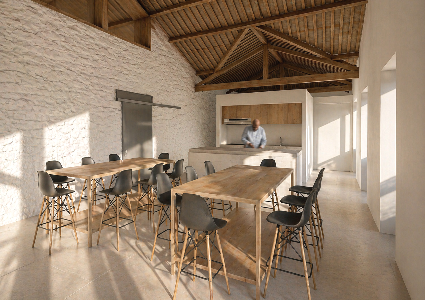 Espacio principal de uso comunitario en la Escuela Unitaria de San Lorenzo (A Guarda, Pontevedra), resultado de una rehabilitación arquitectónica que integra estructura de madera y diseño contemporáneo.