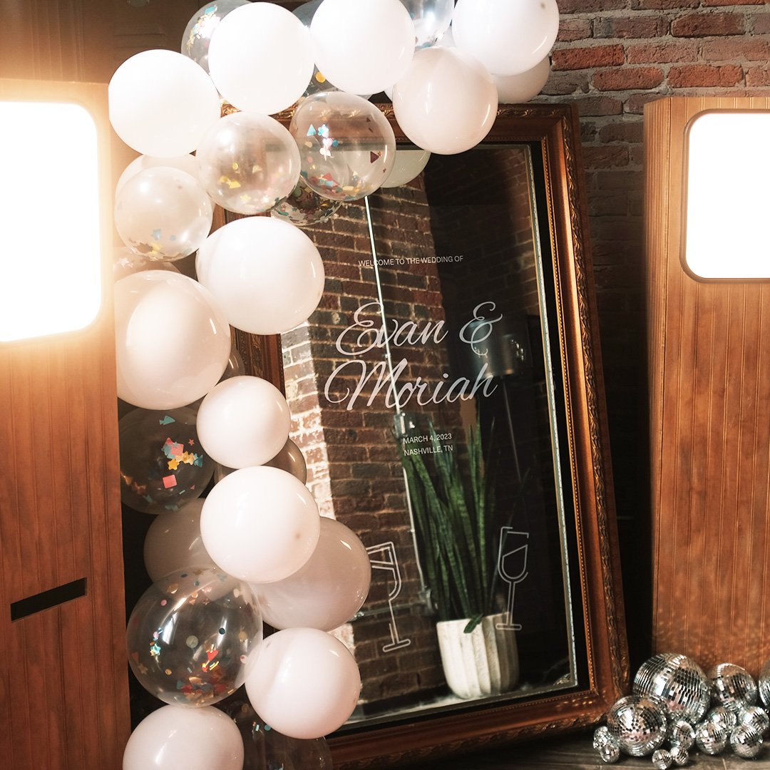 Mirror photo booth with custom wedding announcement information for a wedding in Nashville.