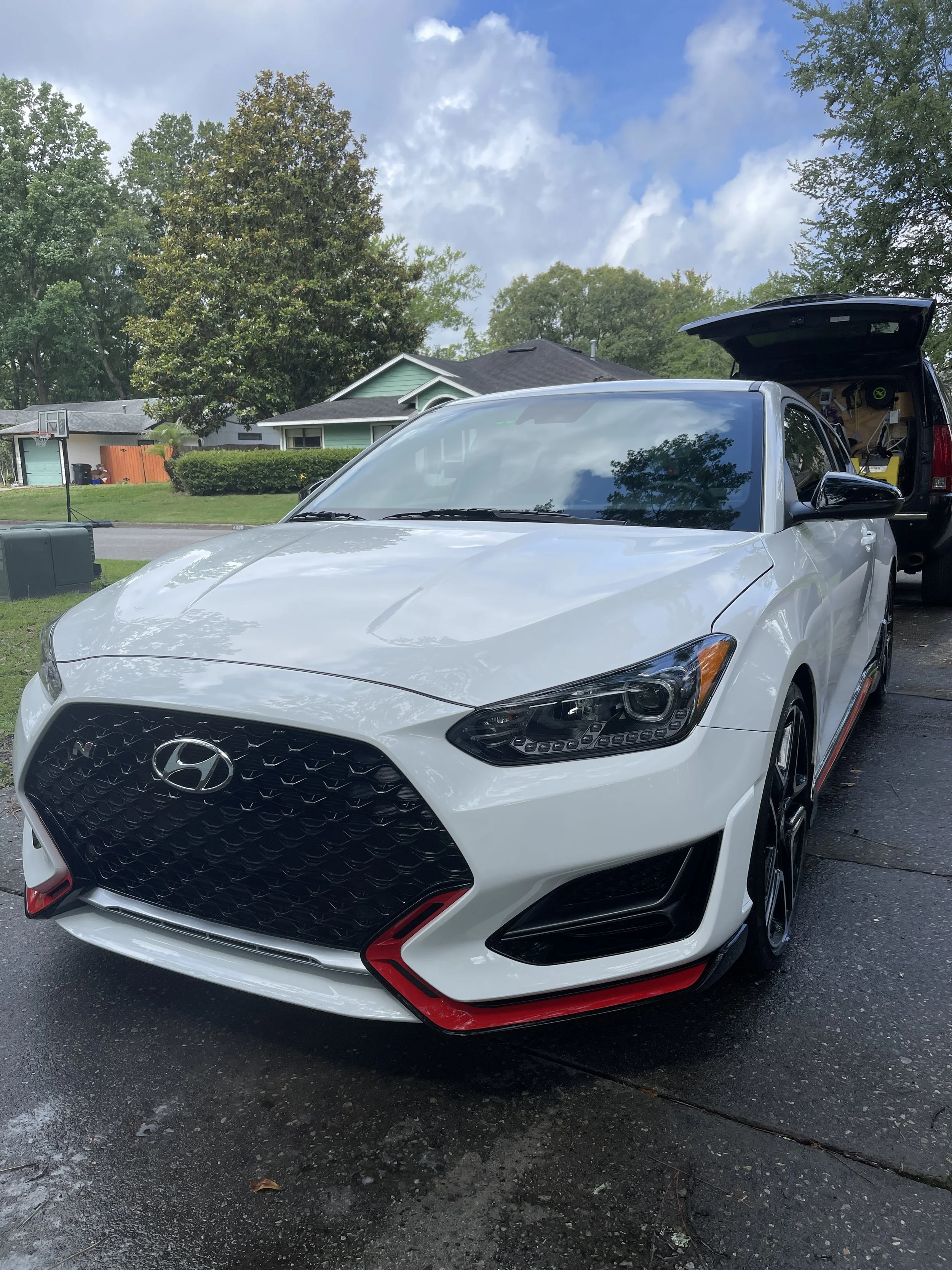 White Hyundai Sonata after a ceramic coating and premium detail by Sylvie Auto Restoration in North Central Florida.