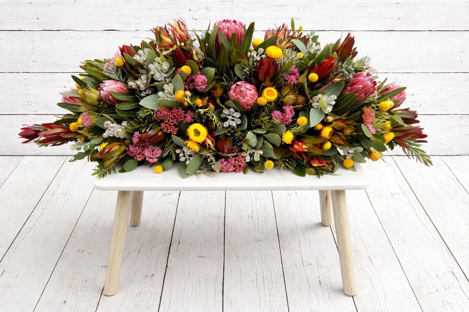 native floral casket spray.png