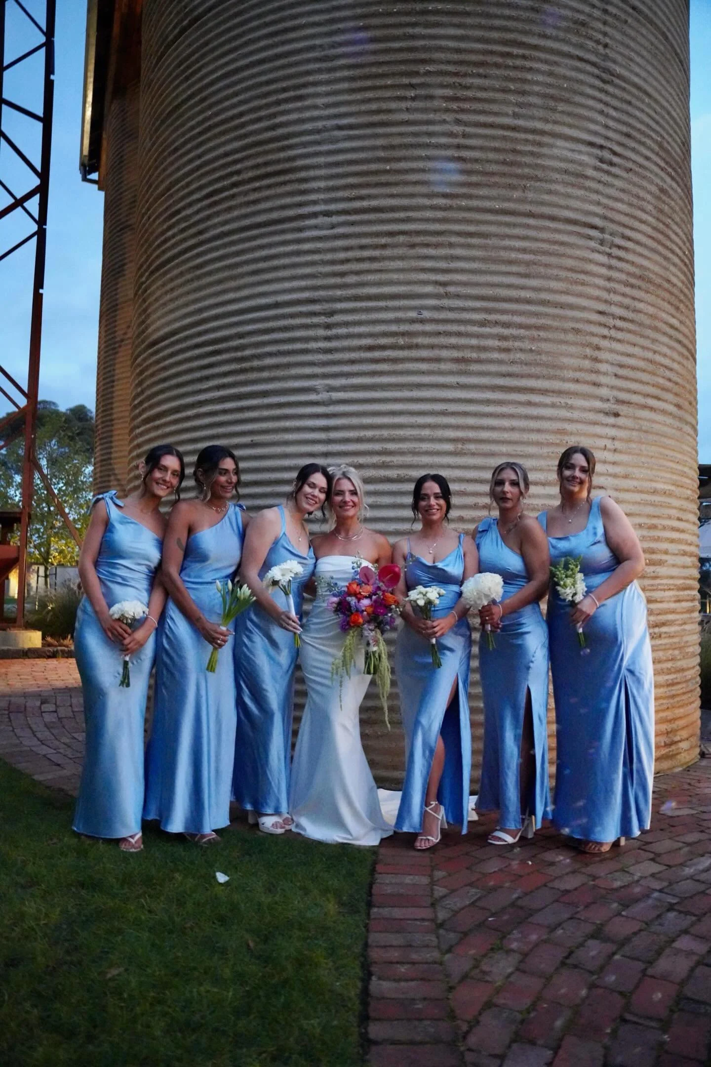 Pale Blue Bridesamaids with white flower bouquets Warrawong weddings