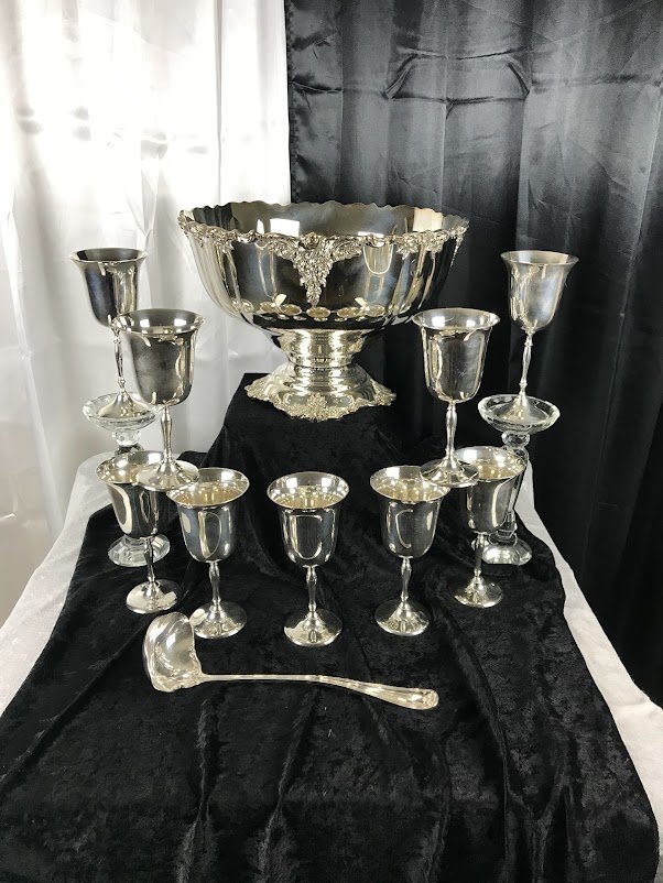 Elegant silver goblet and punch bowl set, perfect for weddings, celebrations of all types. Includes ornate embossed punch bowl, nine goblets and one ladle, in lovely condition.
