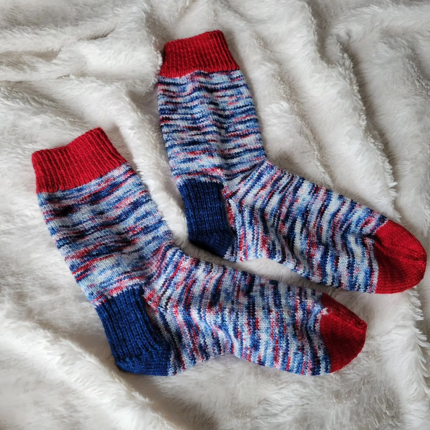 Finished these Buffalo Bills socks as a gift just in time for their season to come to an end... whoops lol

Yarn from @megsandco_yarn 
Pattern is Vanilla Socks by @thecrazysocklady