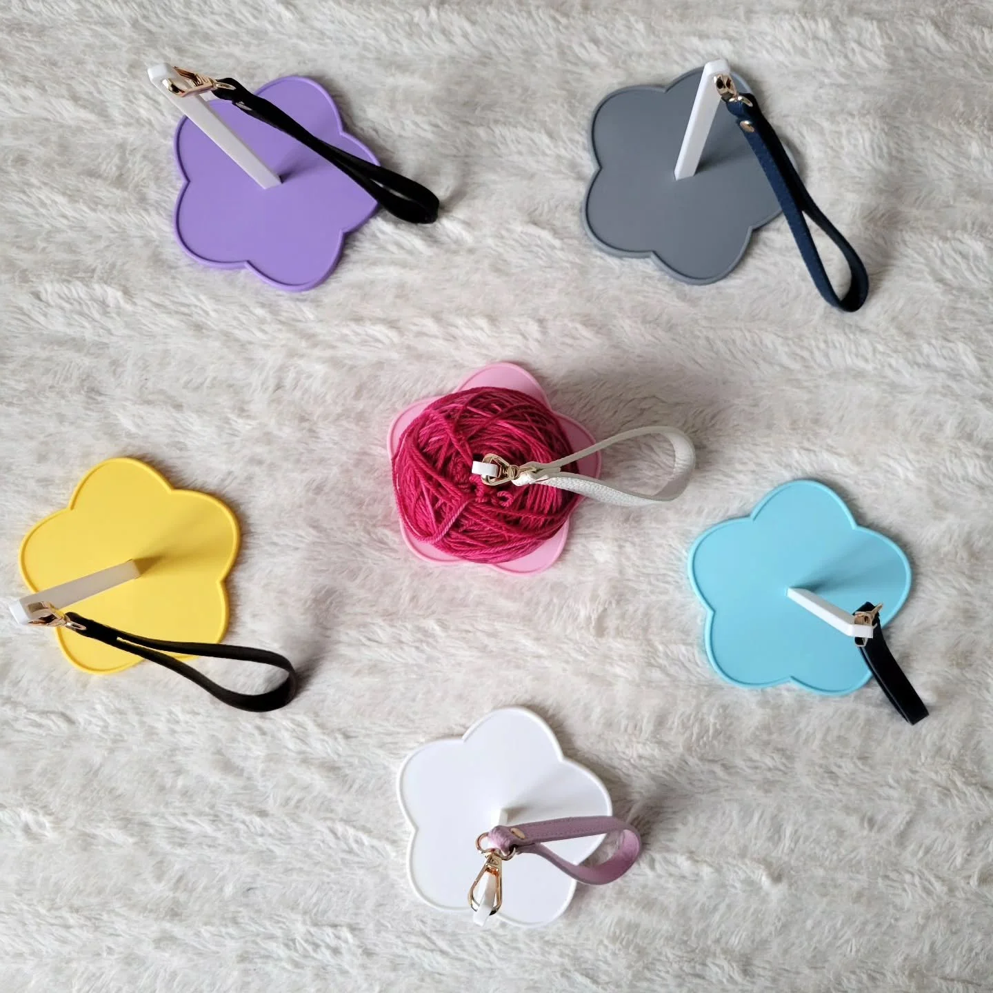 Crafting looks better in color 🧶🌈 Portable yarn spinners available in pink, yellow, white, purple, grey, and blue.