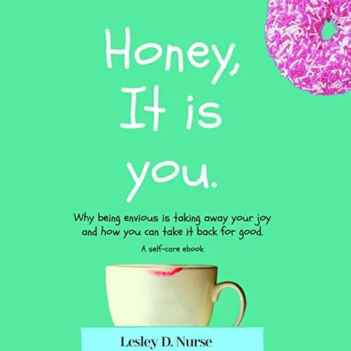 Book cover titled 'Honey, It is you' with a pink frosted doughnut in the top right corner, a white coffee mug with a red lipstick mark, and a blue banner with the author's name, Lesley D. Nurse.