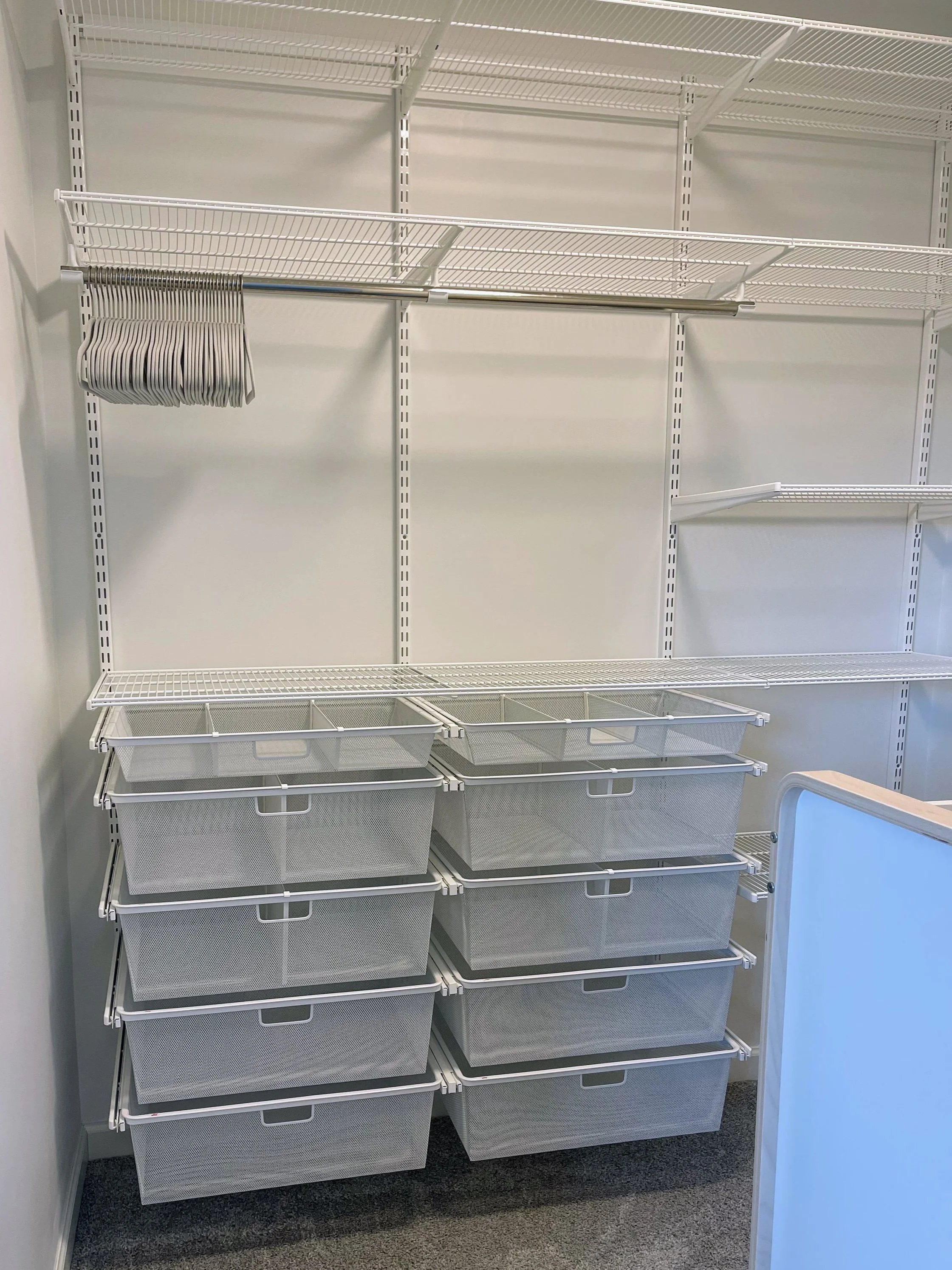 Custom nursery closet with The Container Store Elfa system installed