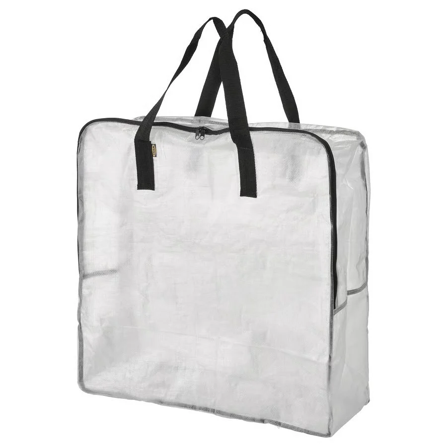 Clear IKEA DIMPA zippered storage bag for storing seasonal clothing, blankets, and other soft items.