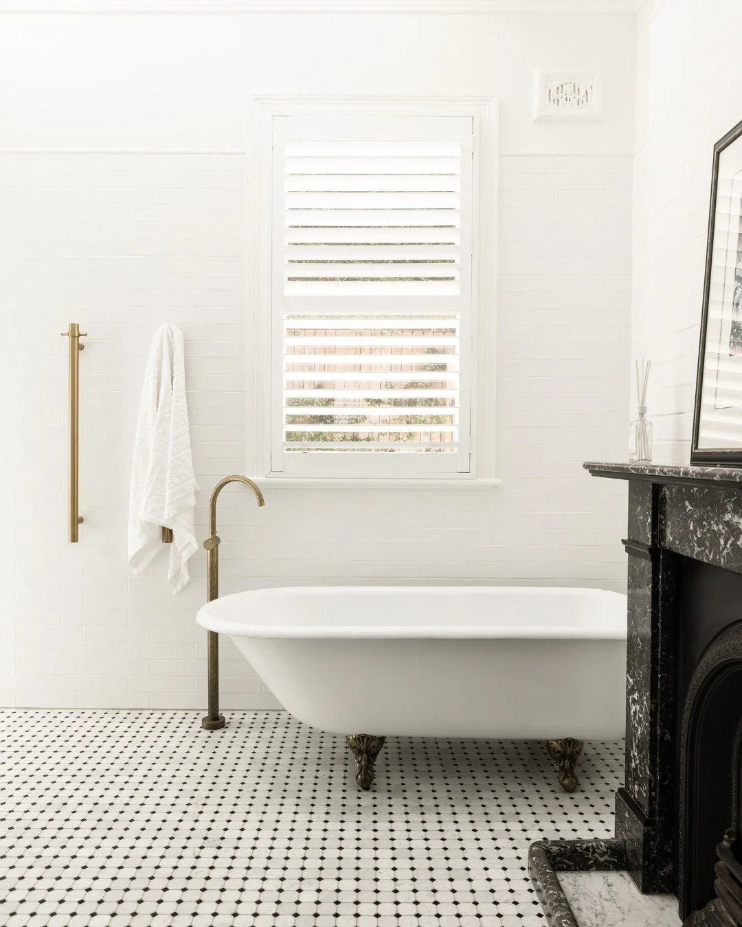 A fireplace in a bathroom? Absolutely. 🛁

 We recently shared the beautiful front door of this Manly heritage home, but there's another space worth revisiting.

Completed a few years ago, this bathroom remains one of our favourites.

Our clients wer
