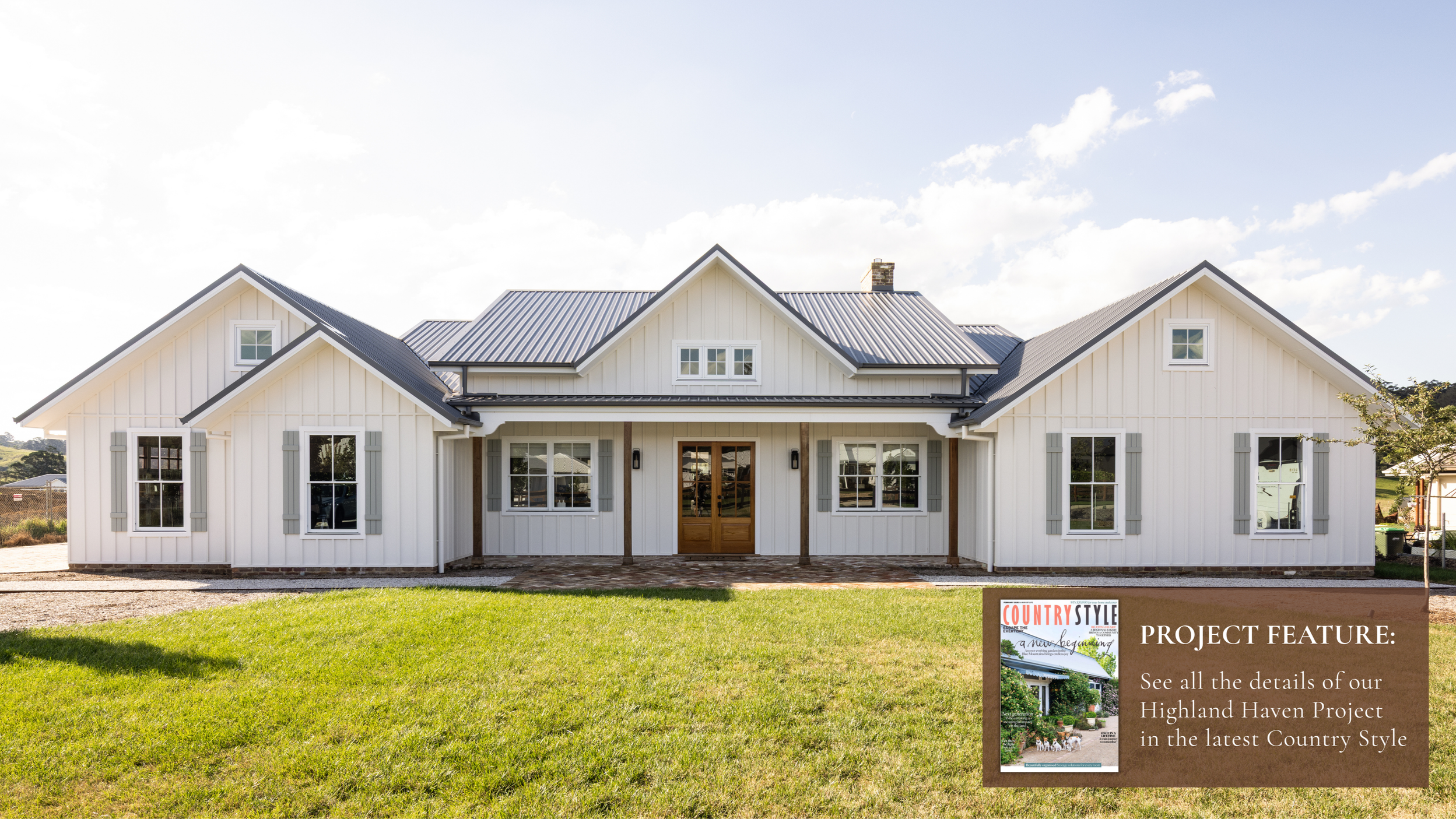 Hamptons-inspired new build featuring a white exterior, pitched rooflines and a spacious front lawn.