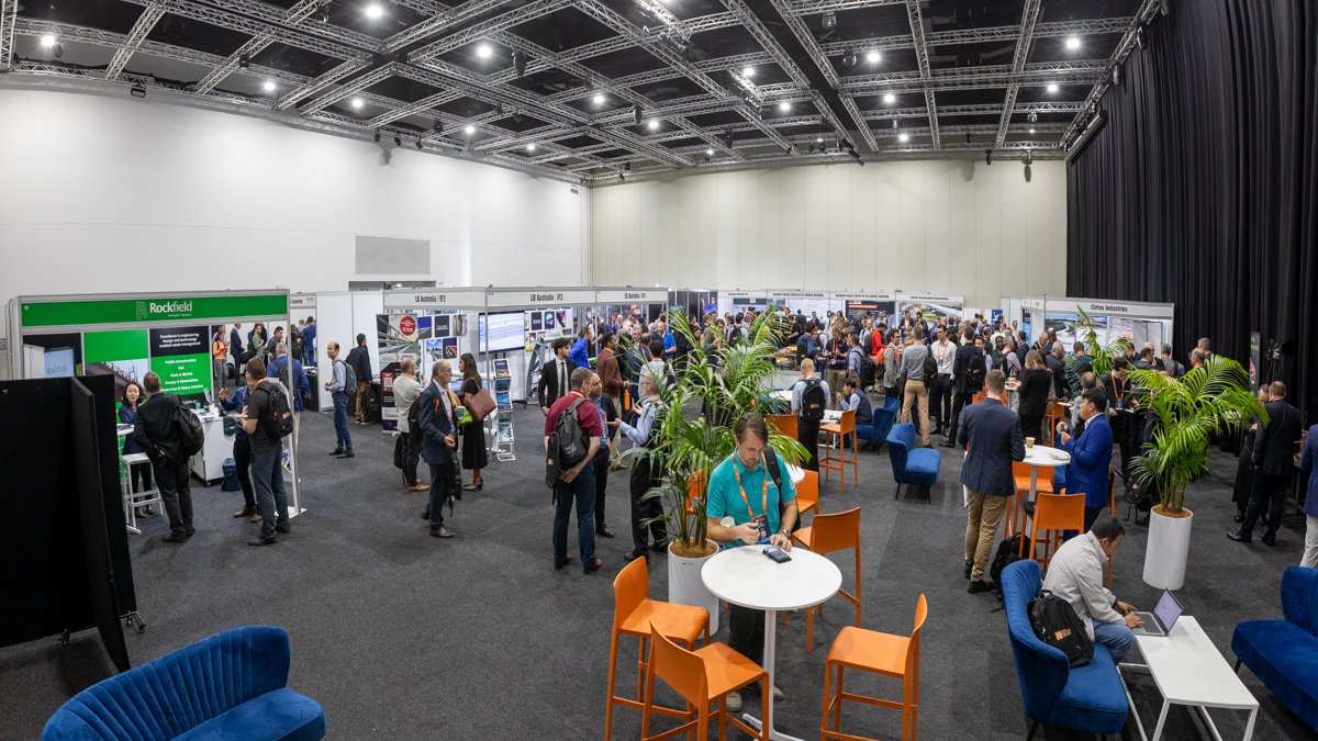 Wide room conference expo photo of guests networking, relaxing and interacting with sponsors and exhibitors at the Austroads Bridge Conference 2025 at RICC.