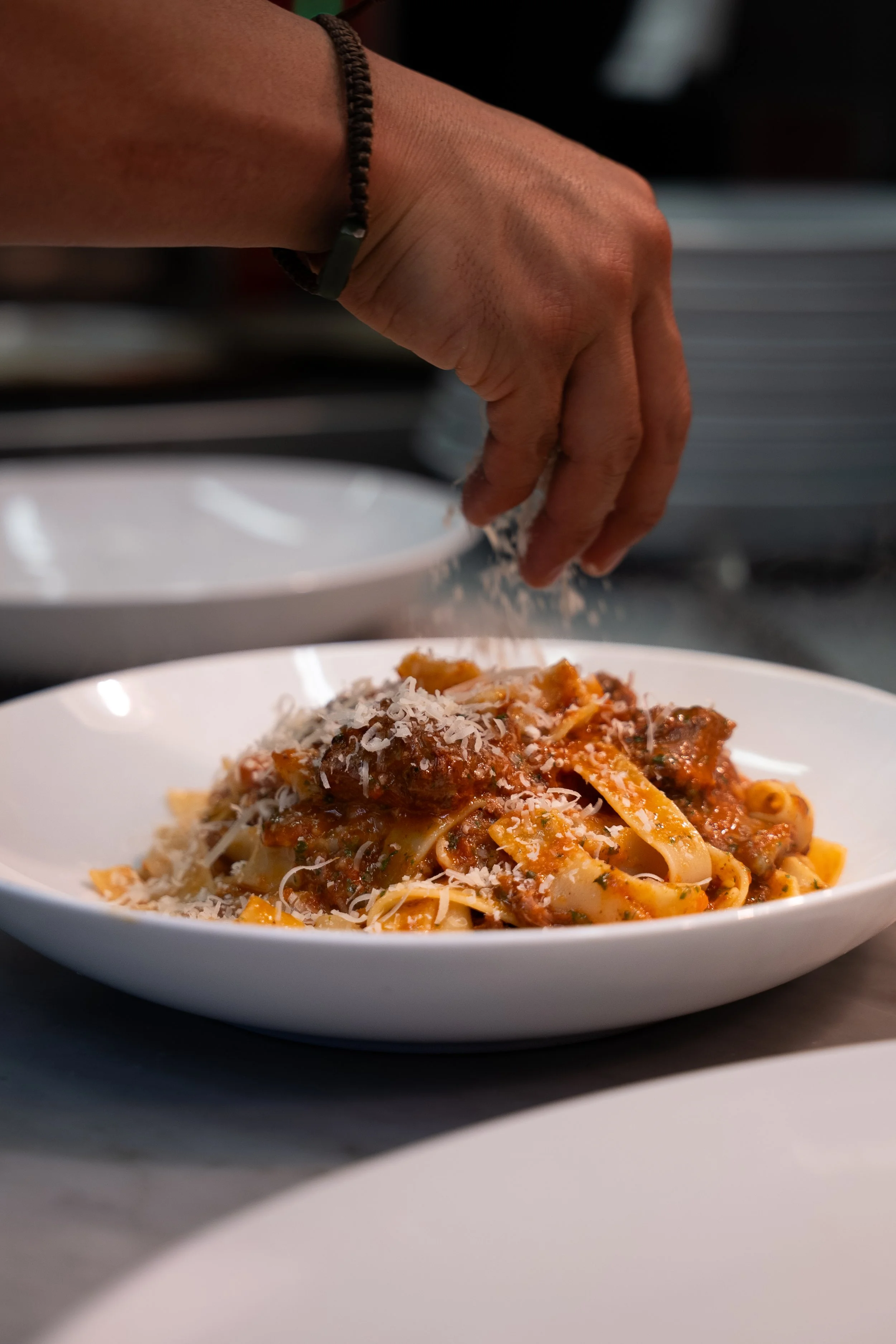 Pappardelle Ossobuco Ragu pasta with wine pairing at Fellini Italian Restaurant Hobart
